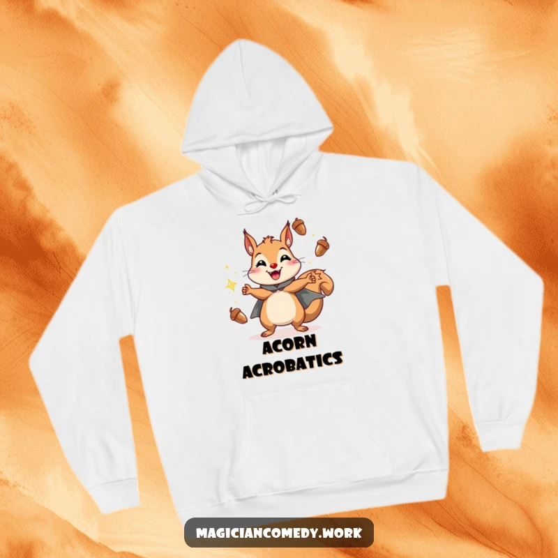 Funny squirrel juggling hoodie featuring a cheerful squirrel in a cape juggling sparkling acorns with a grin, warm and humorous.